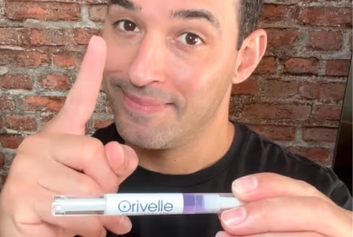 Holding the Orivelle nail-care pen